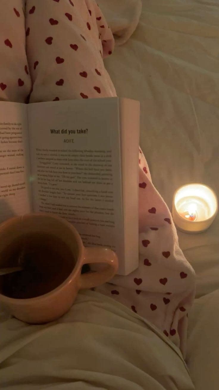 Cozy reading nook with a book and warm lamp light