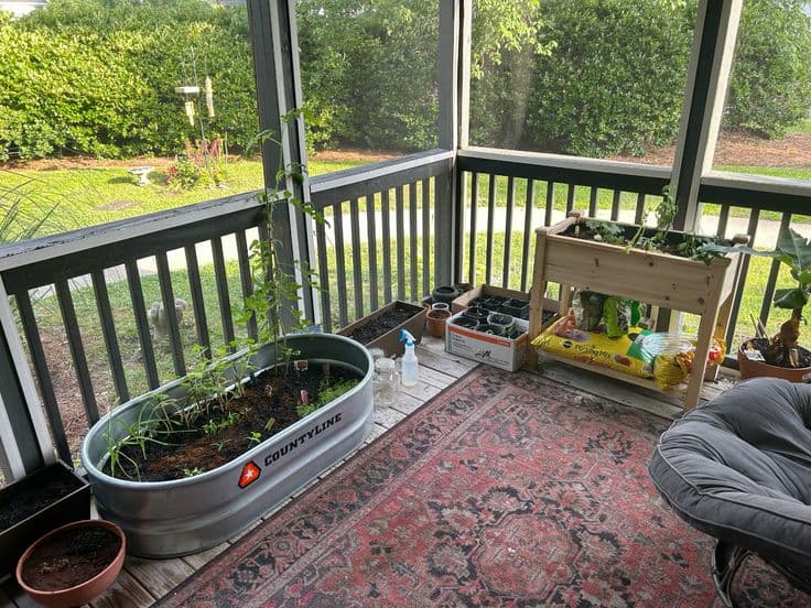 Porch with planters and a well-kept home garden