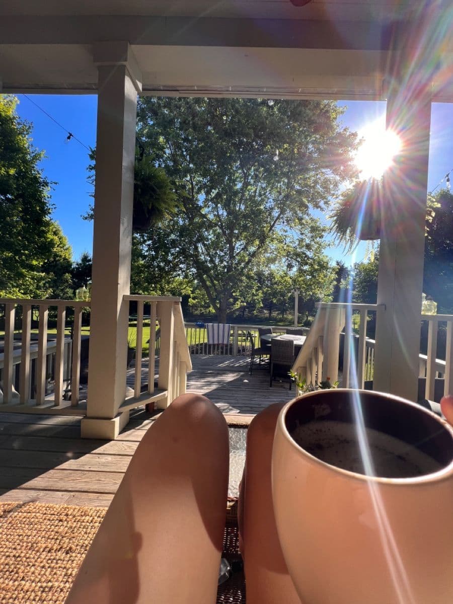 Sunlit porch with morning coffee and soft natural light